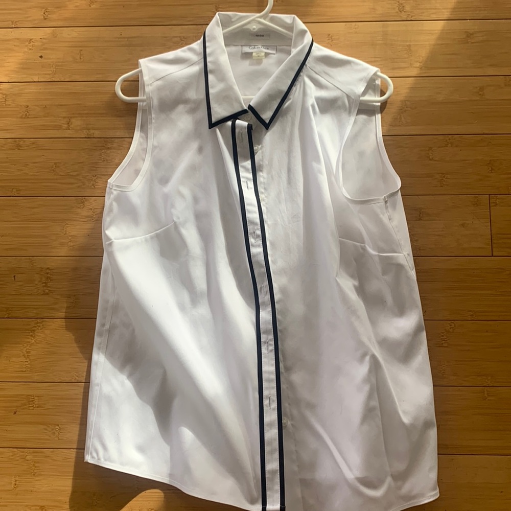 Sleeveless white top